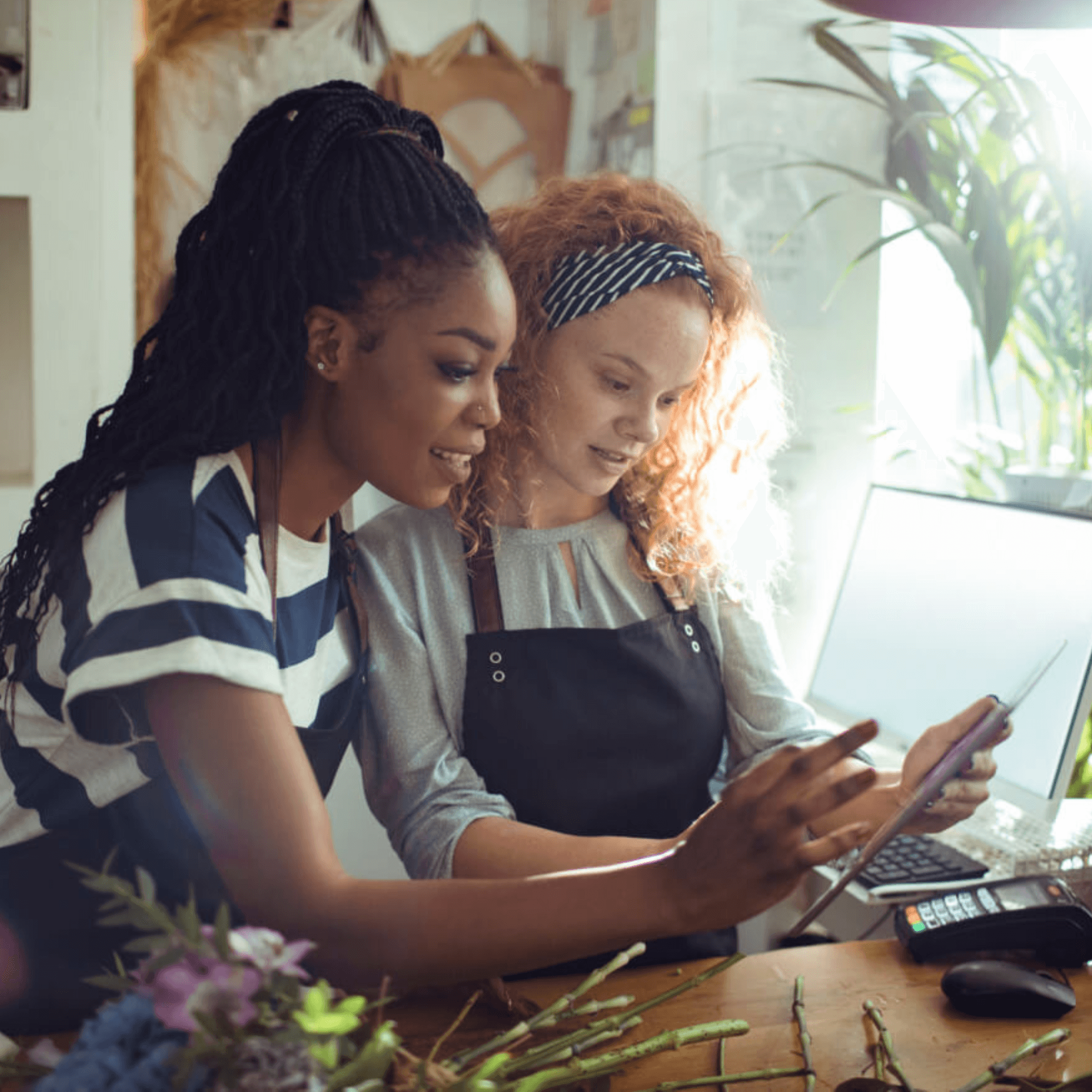 Two dispensary staff members review a customer’s order on a tablet, surrounded by flowers and POS hardware. This image highlights:
Operational Clarity: Meadow’s all-in-one platform streamlines sales, inventory, and compliance, giving staff the confidence to serve efficiently.
Secure Checkout Integration: Stronghold’s digital payment system enables compliant, cash-free transactions, empowering teams to stay focused on the customer.